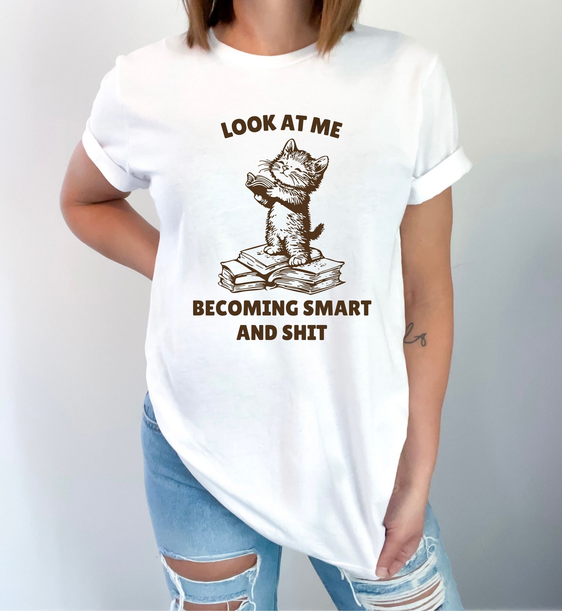 Humorous Cat Reading T-Shirt – 'Look at Me Becoming Smart and Sh*t' – Unisex Graphic Tee for Book Lovers-White-Family-Gift-Planet