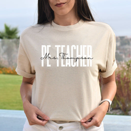 Personalized PE Teacher T-shirt gift Custom Physical Education Teacher Unisex Tee Sand Pink Light Blue-Sand-Family-Gift-Planet