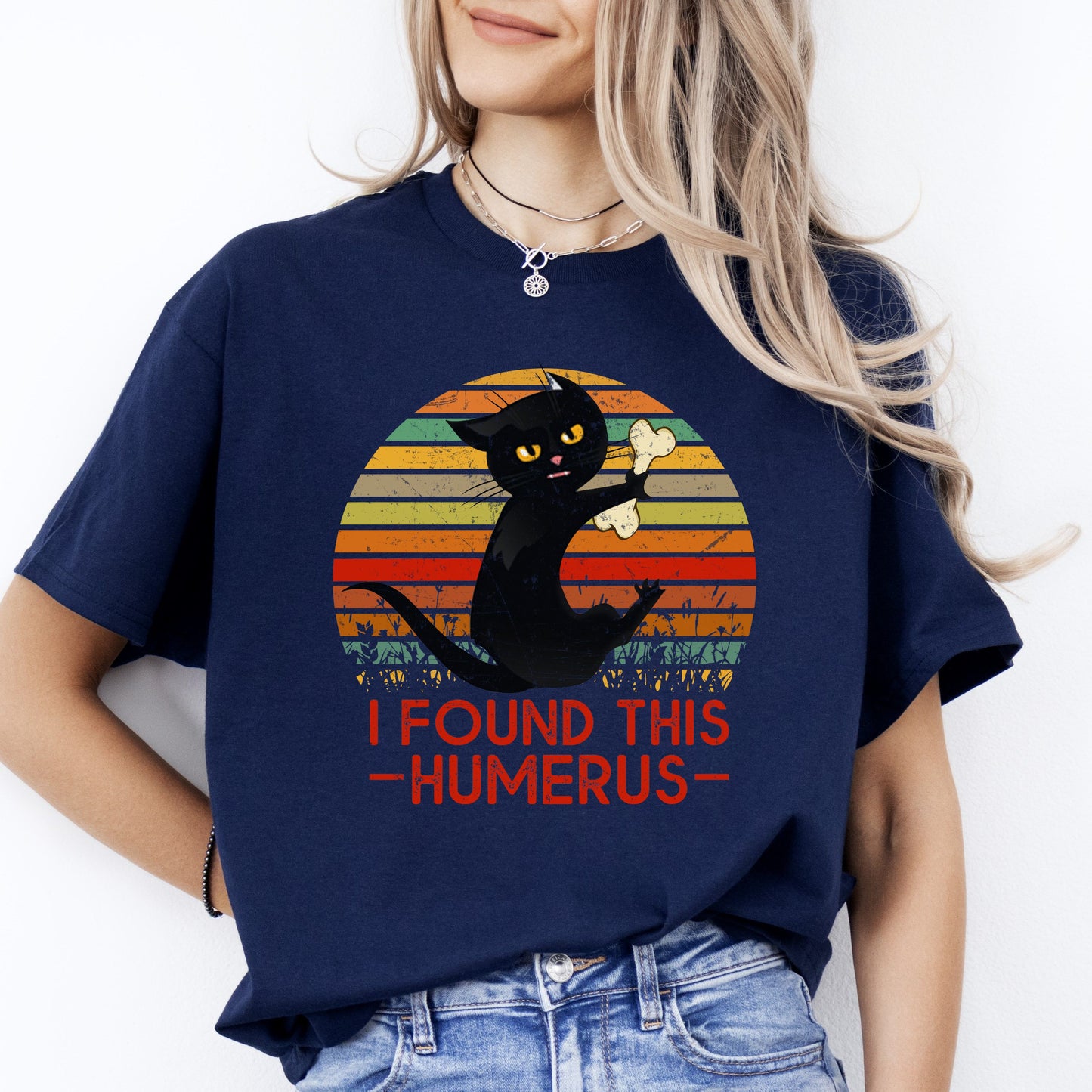 I found this humerus T-Shirt gift orthopedics Black Cat with bone Unisex Tee Black Navy Dark Heather-Navy-Family-Gift-Planet